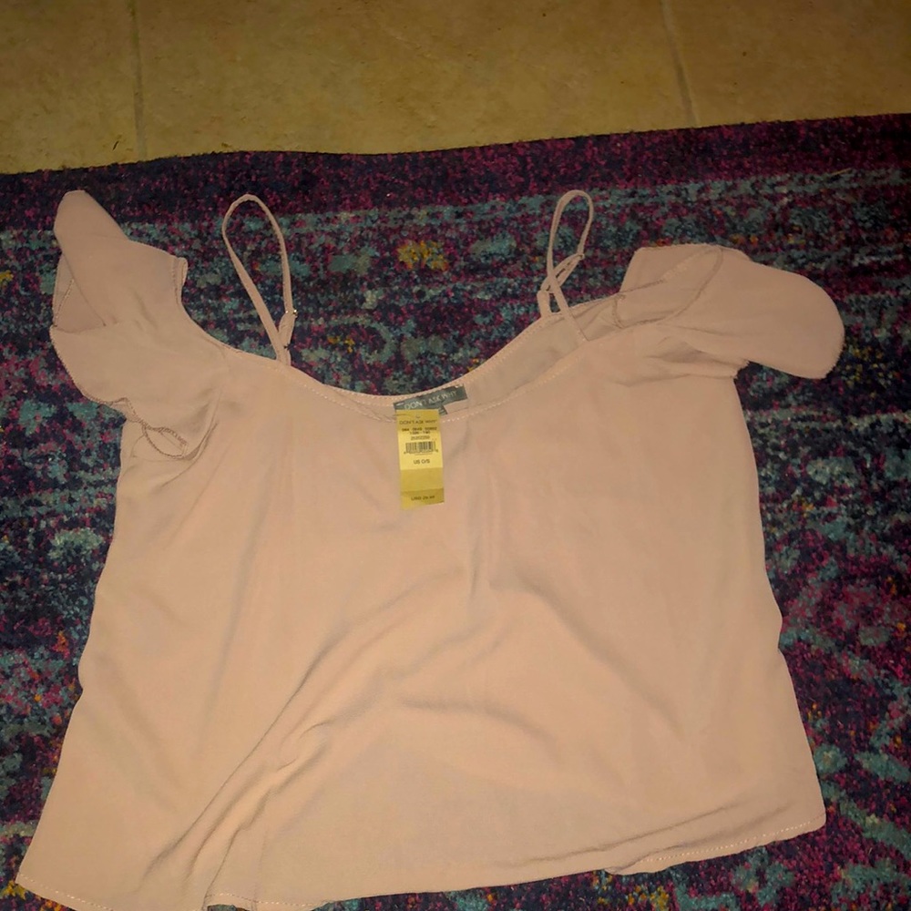 cute top with through the shoulder sleeves as well as straps.
